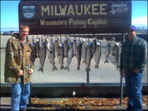 2 guys with the fish they caught on Lake Michigan