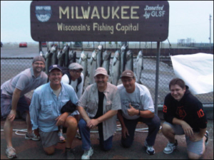 group in front of their fishing haul