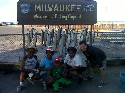 group of 5 with their fishing catch