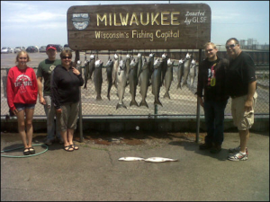 group of 5 with their catch from the charter